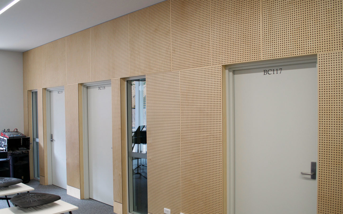 Perforated Wooden Wall Panels Designed by Keystone Linings at kildare Catholic College