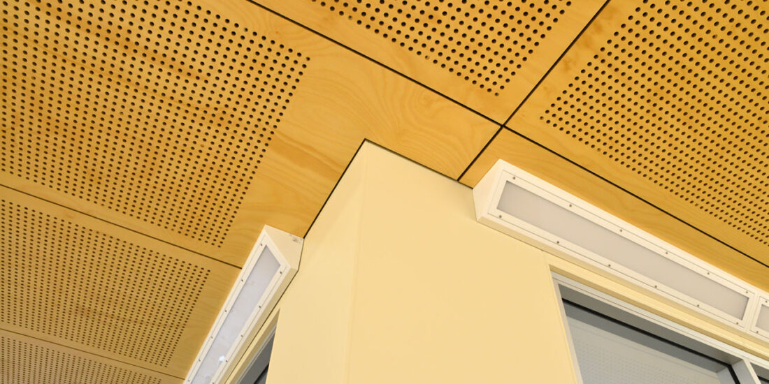 Acoustic perforated hoop pine plywood panels designed & manufactured by keystone linings at mosman prep school