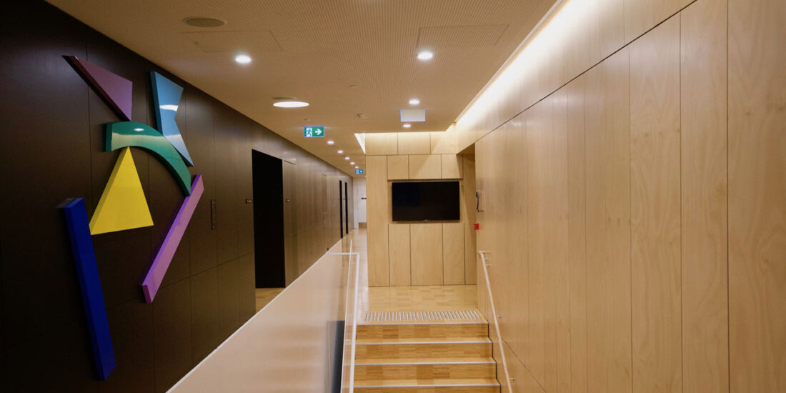 Perforated acoustic plywood panels for the ceiling. Designed by keystone linings at university of south australia