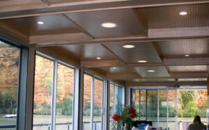 Key nirvana acoustic ceiling panels with a vanilla oak veneer designed by keystone linings at carpe diem houseboat