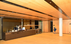 Perforated acoustic ceiling panel designed by keystone linings at state citrix xclusive fitout