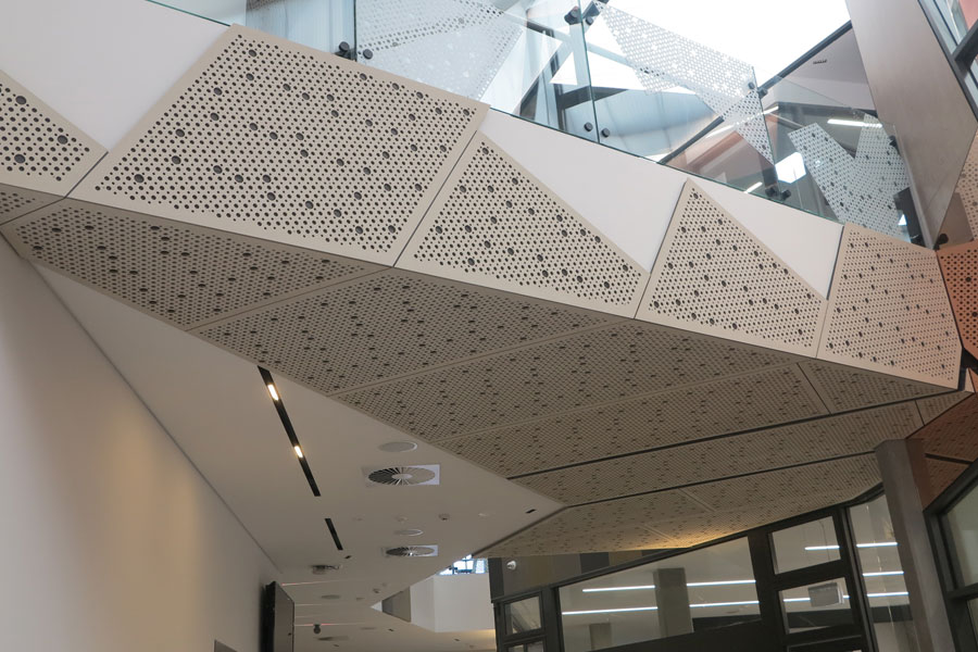 Perforated fibre cement (cfc) panels designed by keystone linings at mentone grammar