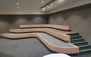 Perforated fc sheet panels and birch plywood panels designed by keystone linings at the holy family catholic school