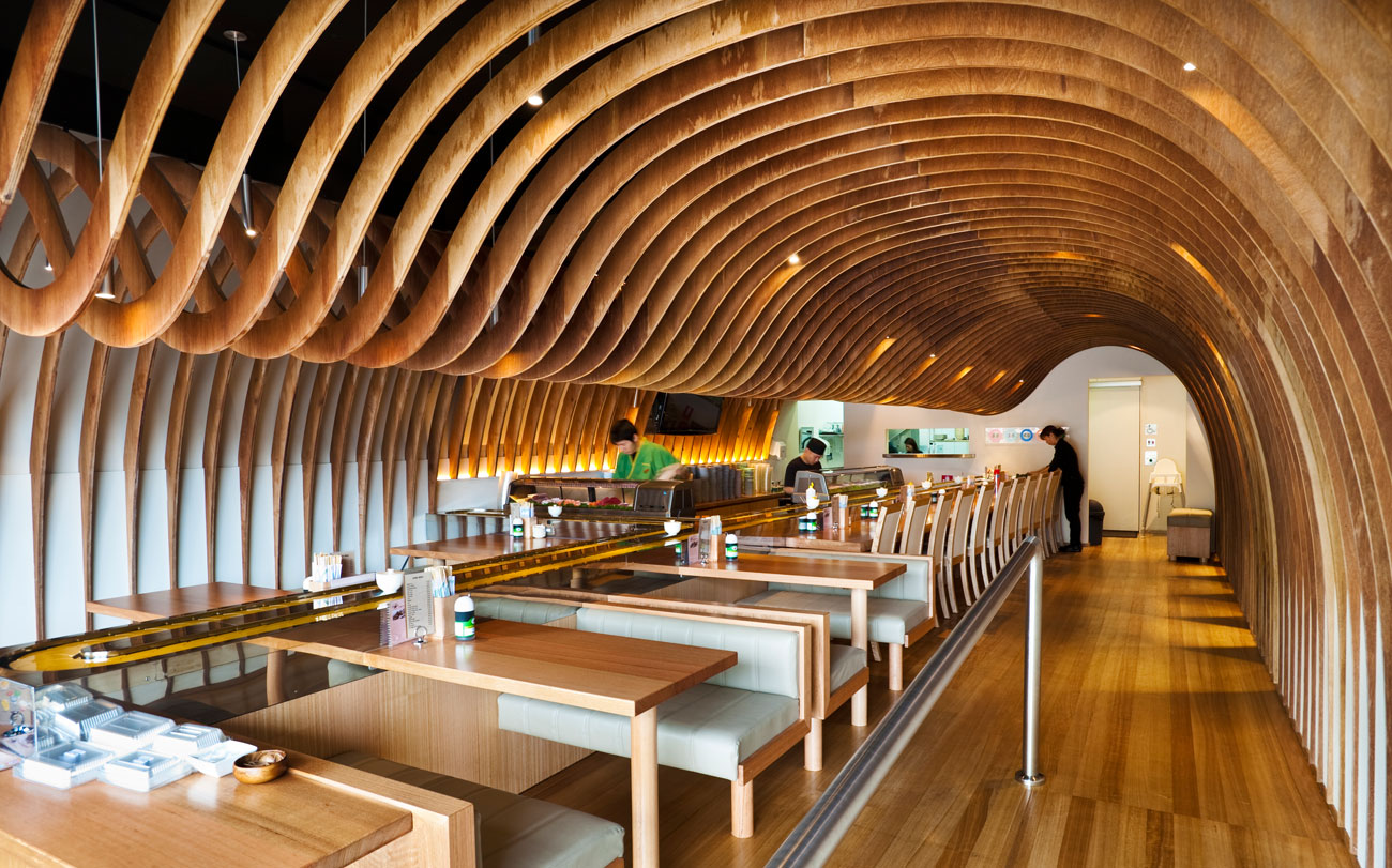 Perforated custom CNC shaped Plywood Ceiling Panels - The Cave Restaurant