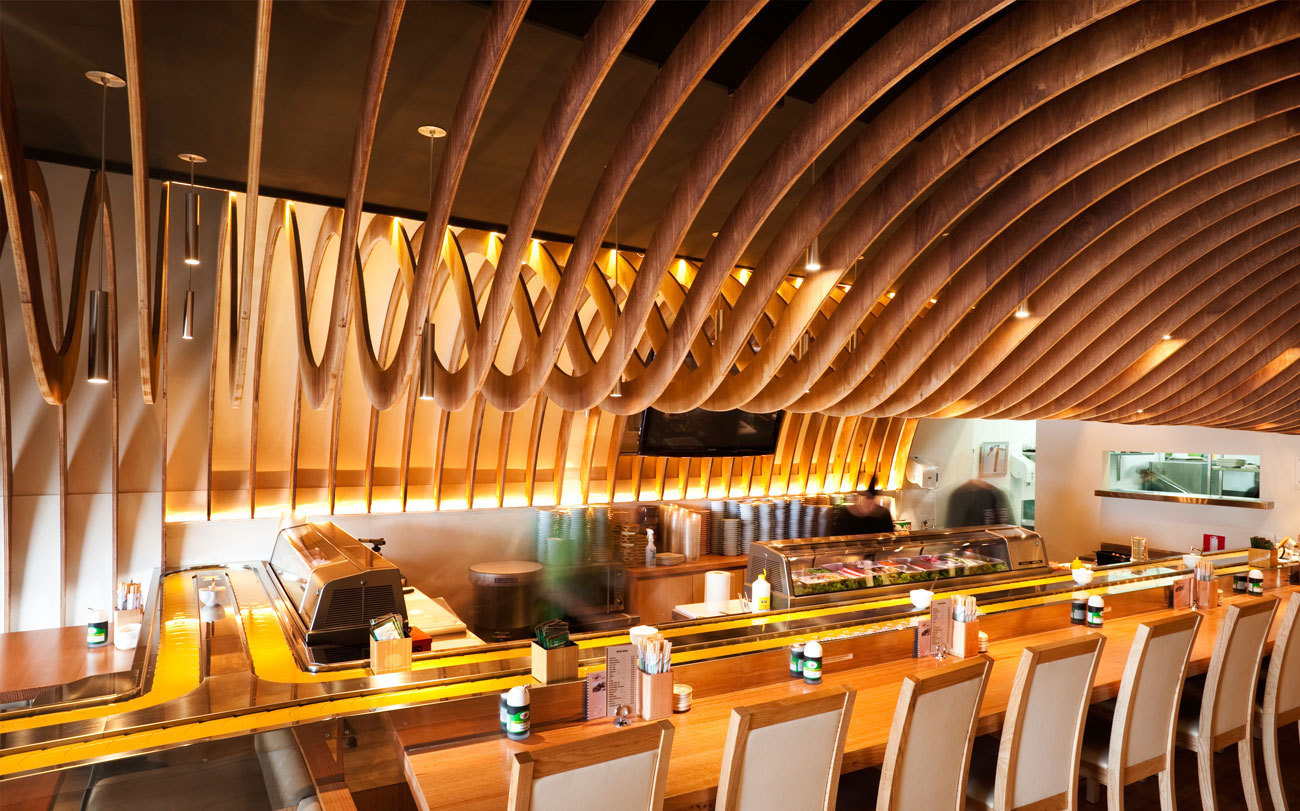 Acoustic panelling on ceilings - the cave restaurant, cnc shaped plywood beams